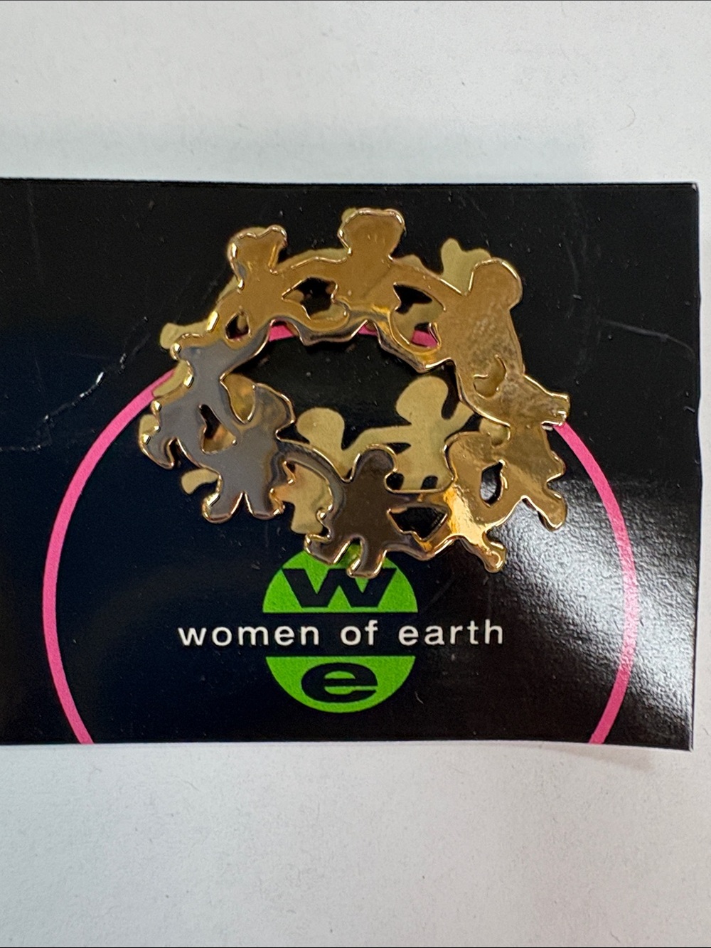 Gold Tone Circle of Figures Brooch